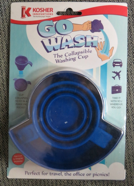 GoWash: Collapsible Wash Cup packaging design. I came up with the name for this product, its logo and the rest f the artwork. I had to anticipate that the actual product would cover a good portion of the blister card.